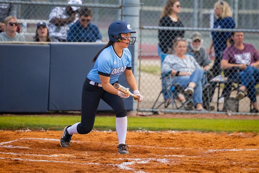 Centennial and Independence High schools play softball